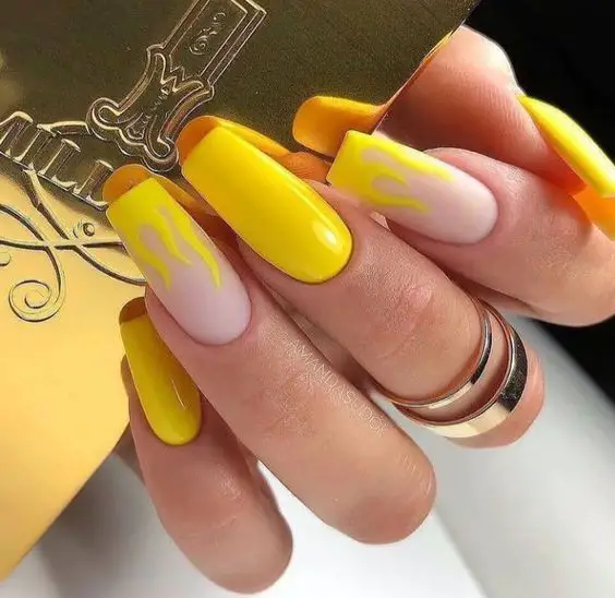 2024's Chic Yellow Spring Nails: Floral, Ombre & Neon Trends"