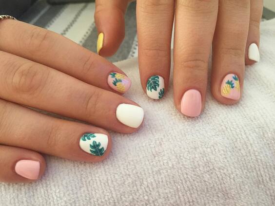 Summer 2024 Nail Trends: Bold Blues & Playful Artistry Designs