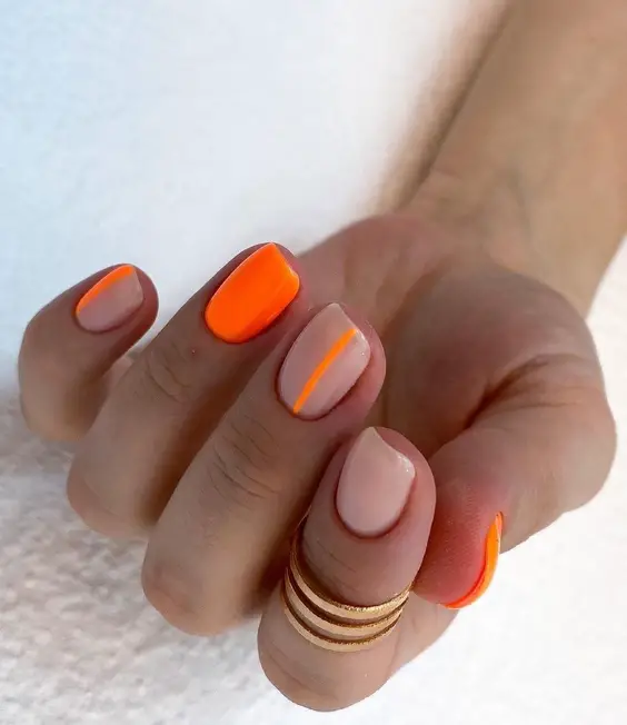 20 Neon Orange Nails 2024: Bold Summer Trends & DIY Glam Manicures