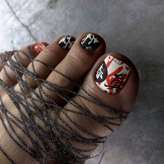 19 Stunning Red Toe Nail Designs: From Classic to Creative Ideas