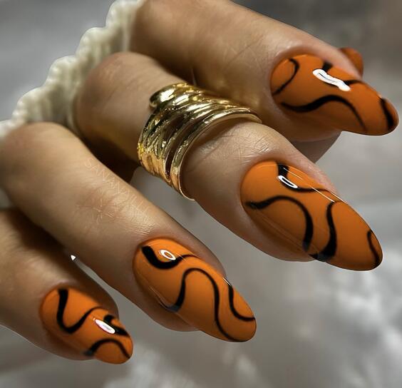 21 Stunning Fall-Themed Nail Designs to Try This Season