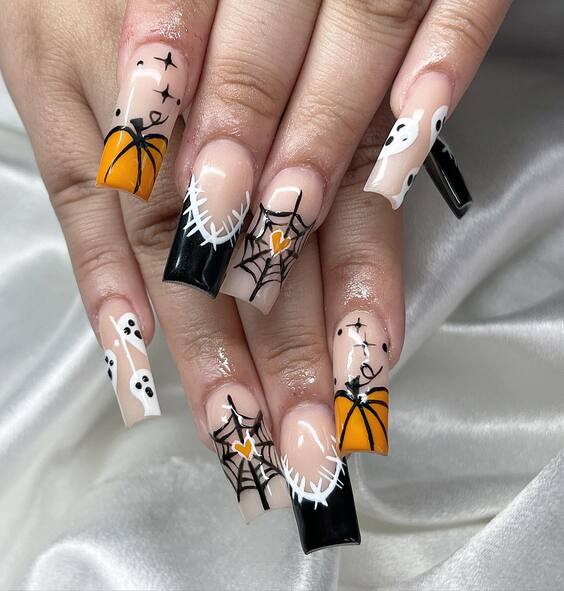 21 Stunning Fall-Themed Nail Designs to Try This Season