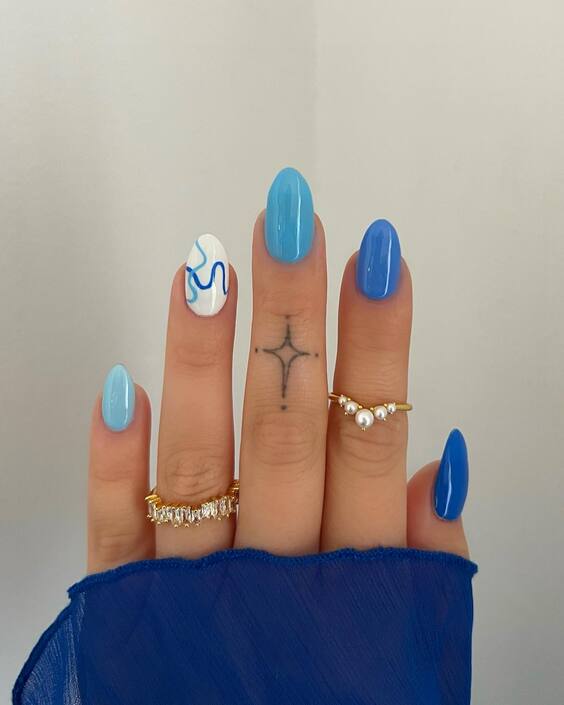 19 Top Blue Nail Colors & Designs for 2024: OPI, Gel, DND & More