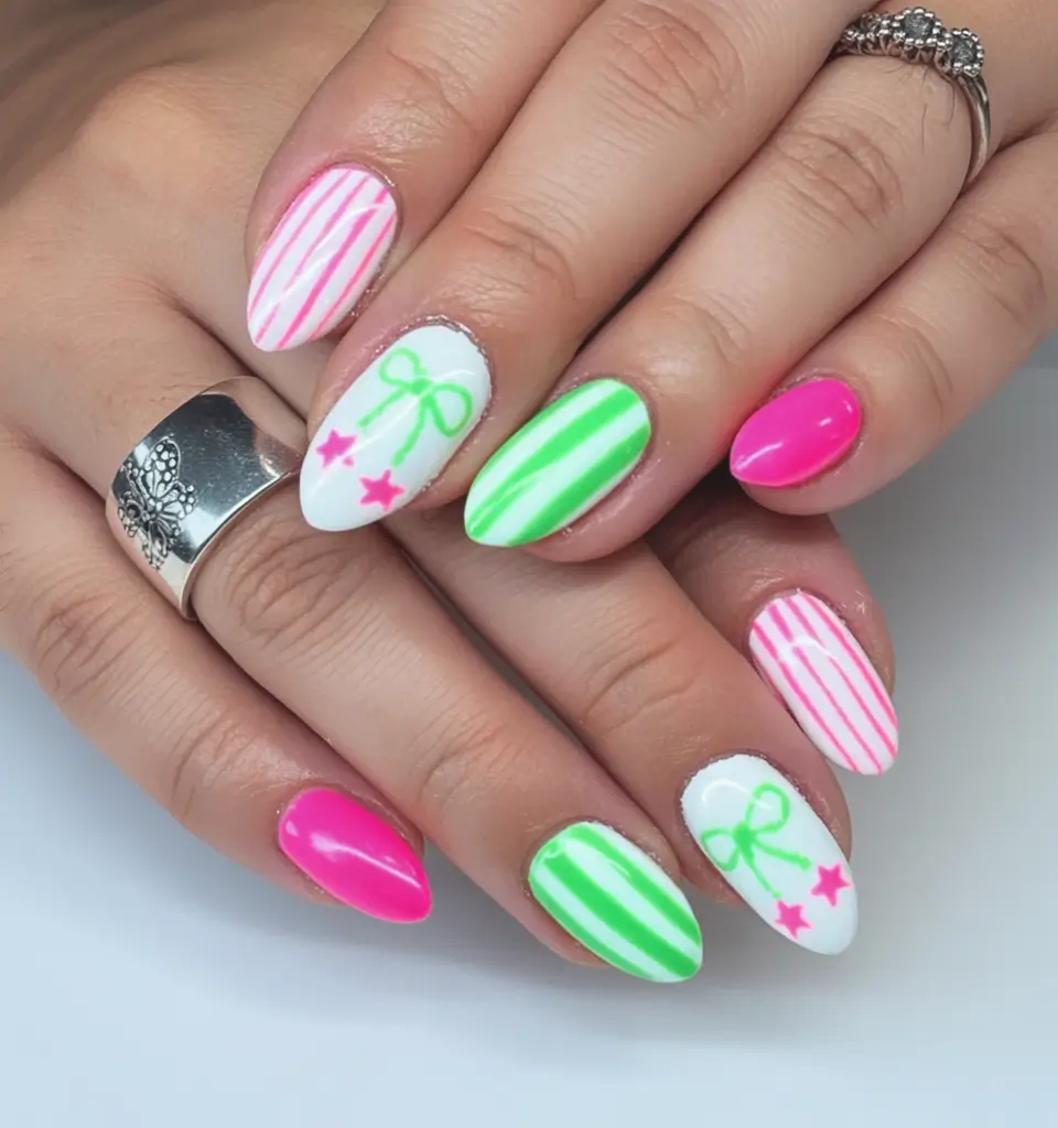 Beach Ready Nails for 2025 Playful Stripes and Bowtie Pops
