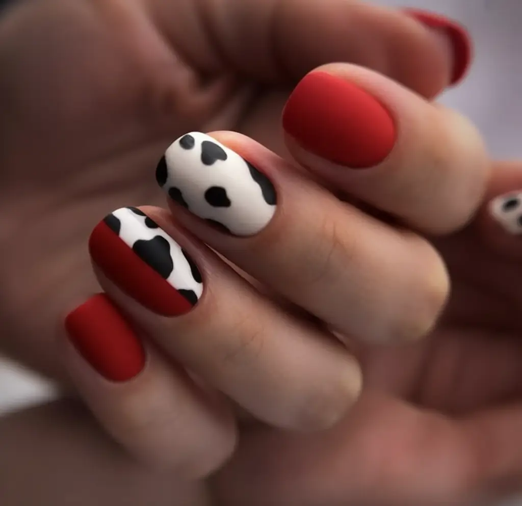 Best July Nail Colors for 2025 Red Matte Meets Cow Print Cool