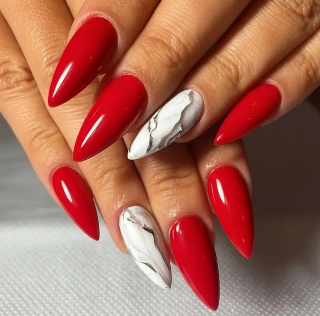 Bold Red Nails for 2025 Summer Red Marble Meets Stiletto Chic