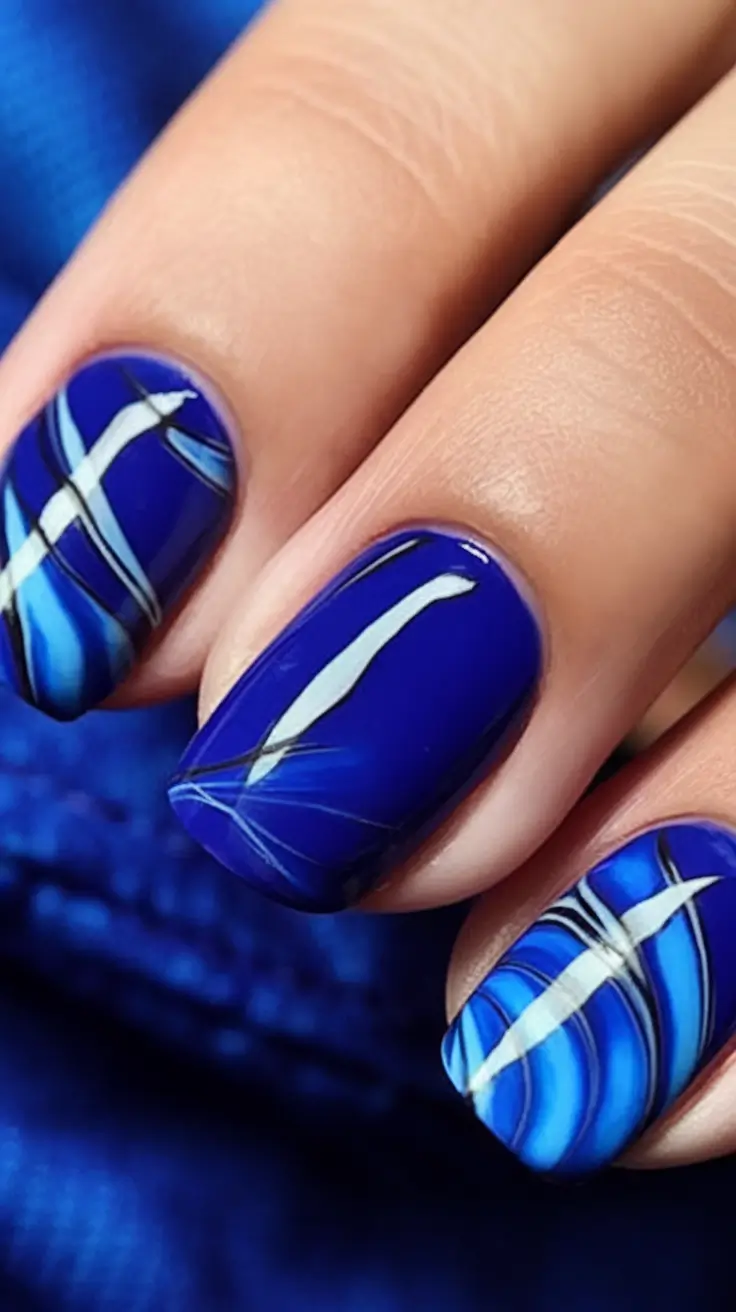 Chill Blue Nails for Summer 2025 Midnight Blue Swirls That Feel Like a Breeze
