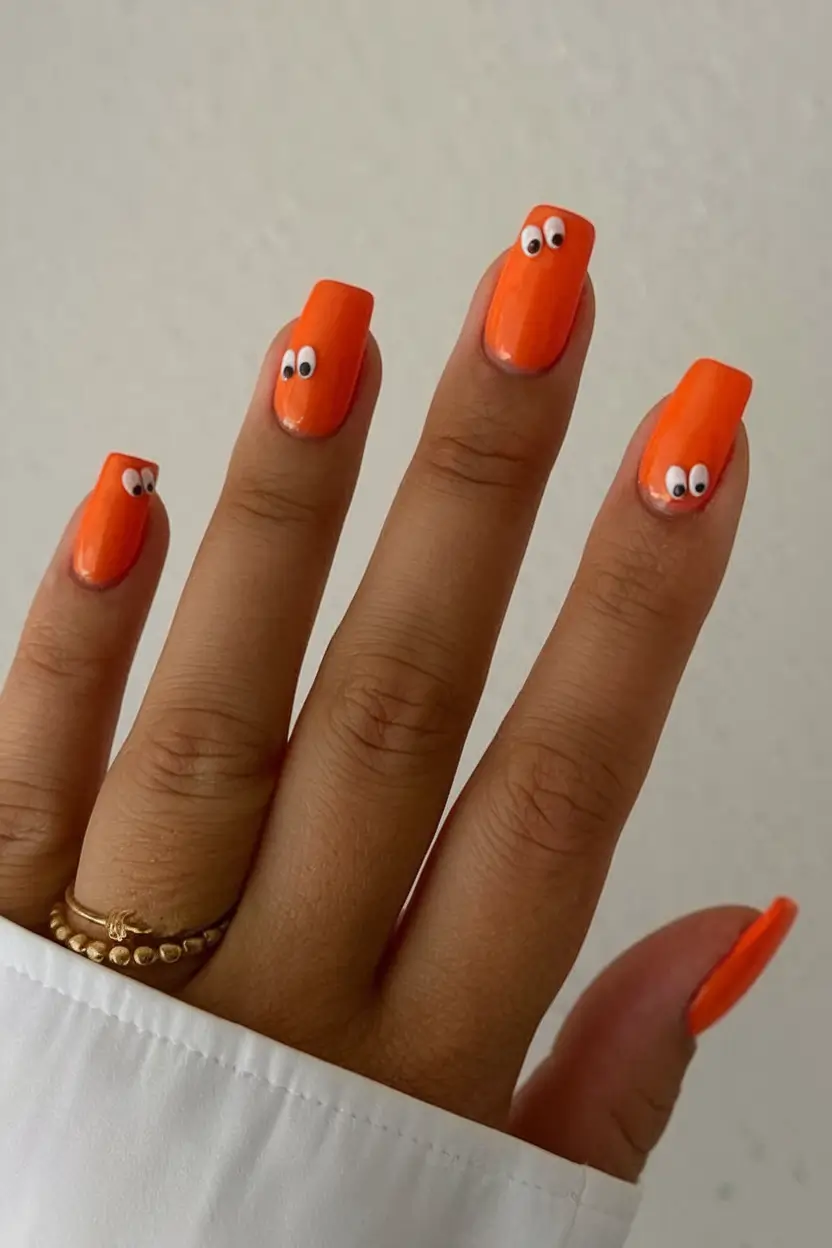 Coffin Nails for Summer 2025 Vibes Bright Orange with Googly Eyes