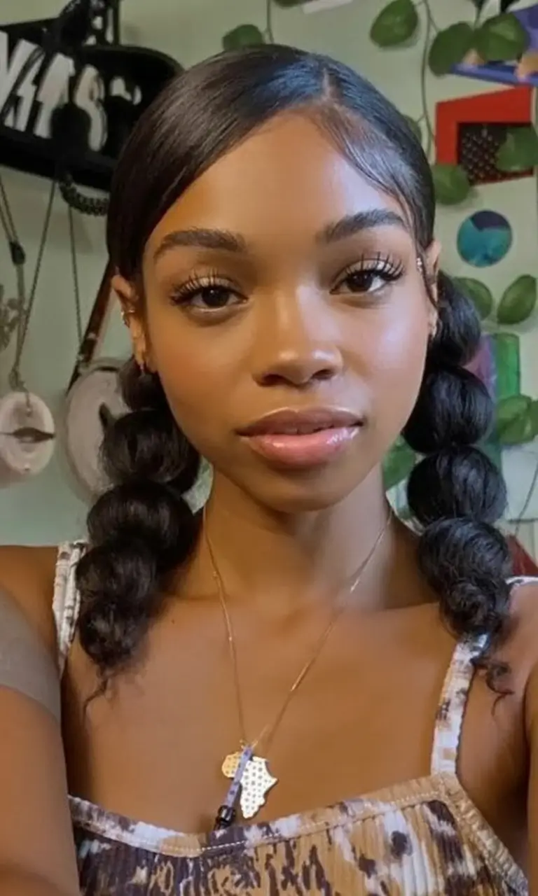 easy summer hairstyles 2025 Playful Bubble Twists with Center Part