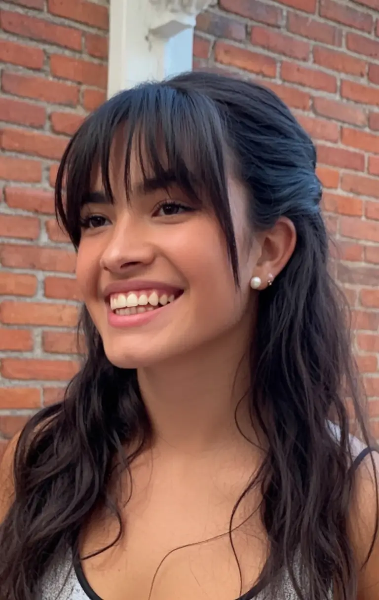 effortless natural hair inspiration for summer 2025! Half-Up Waves With Blunt Bangs