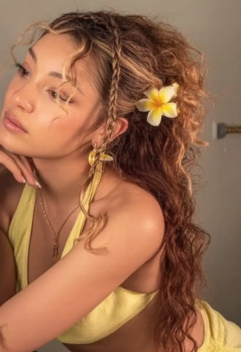 effortless natural hair inspiration for summer 2025! Beachy Volume With Flower-Tucked Curls