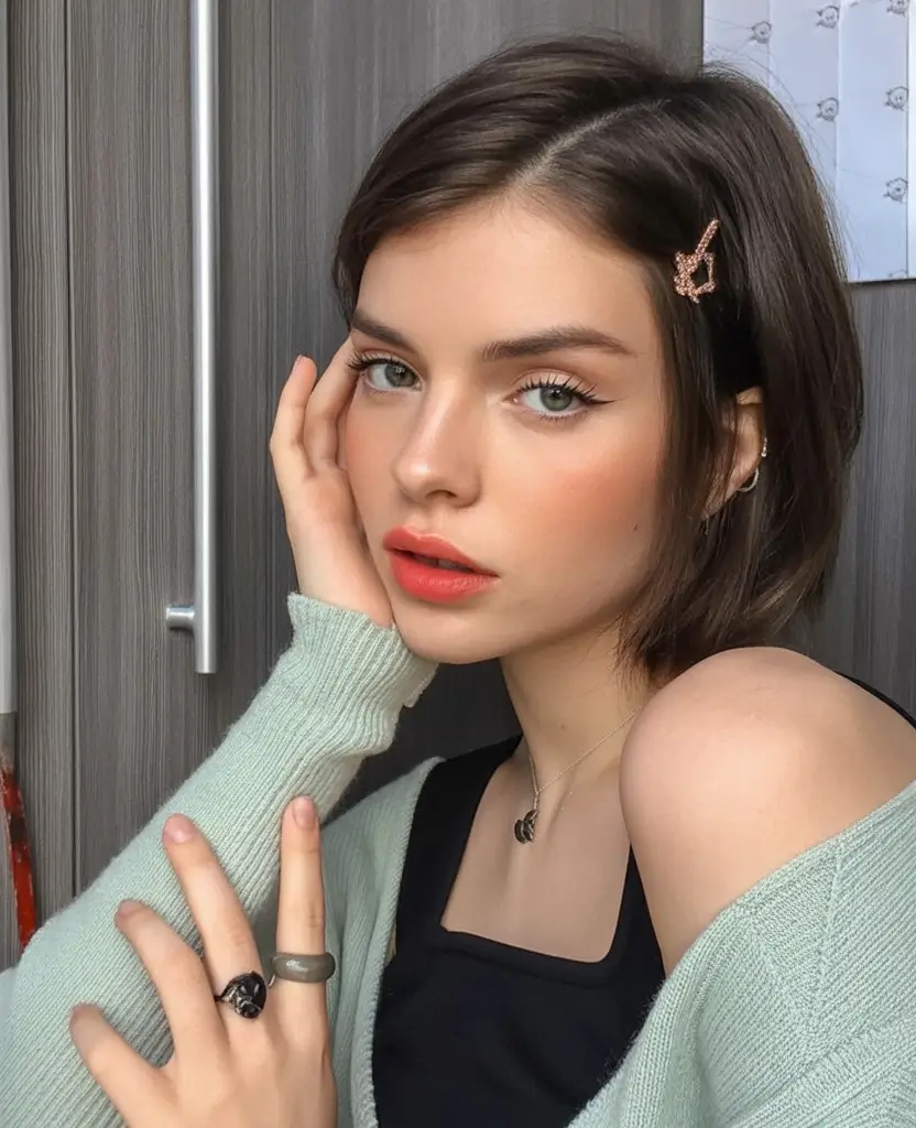 Fresh Trends: Simple Hairstyle for summer 2025 Soft Side-Swept Bob with Clip Detail