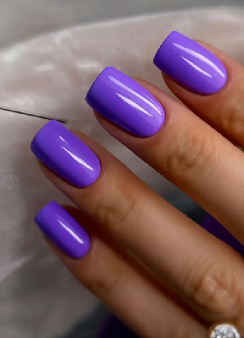 Glossy Gel Nails for Summer 2025 Pure Purple Punch