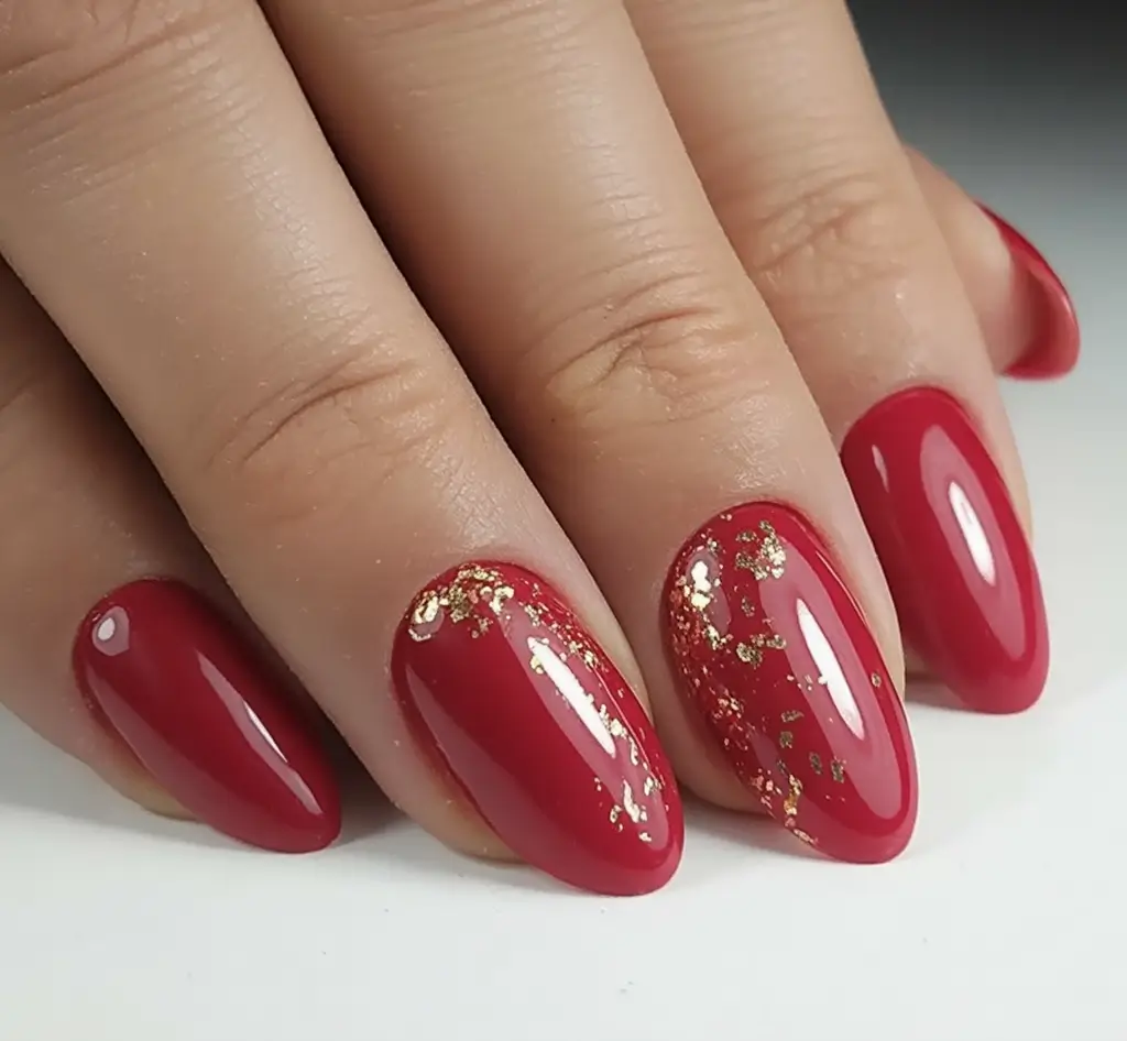 july nails you’ll want in 2025 Gilded Red Glam