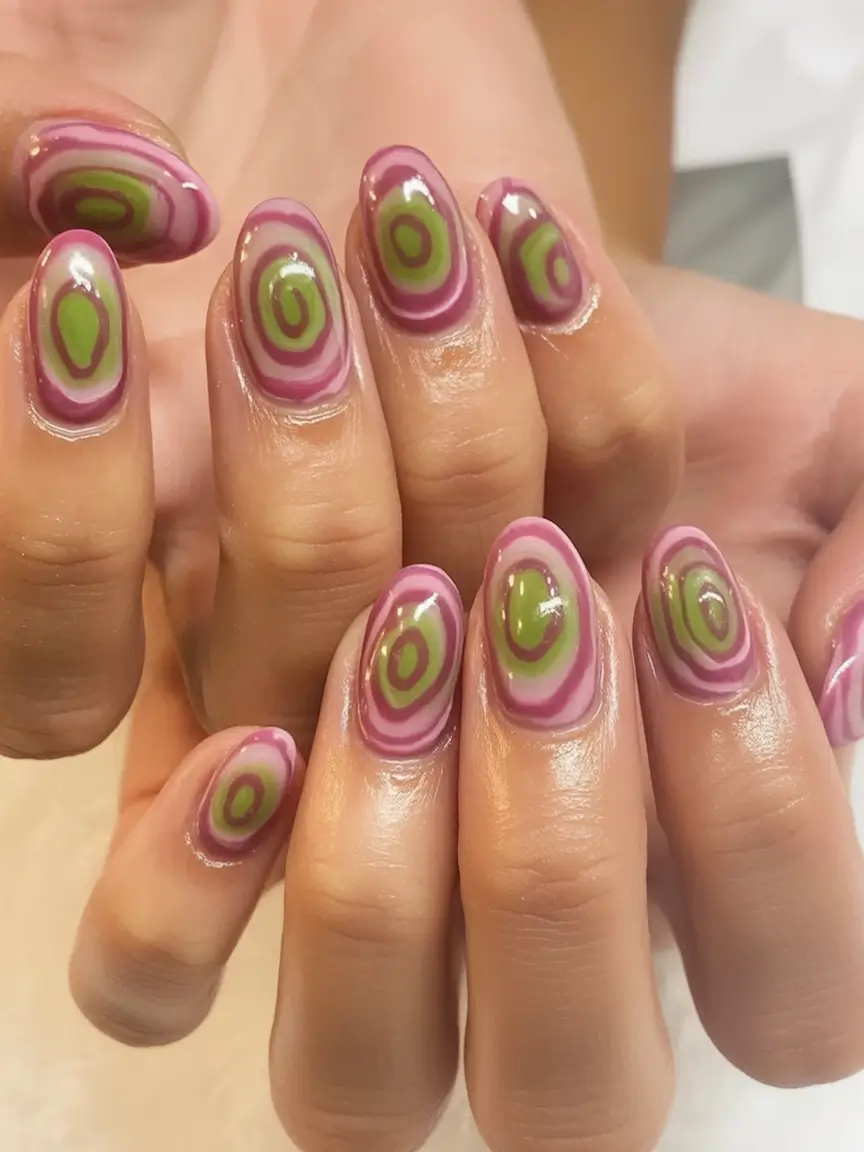 Best June Nail Colors for 2025 psychedelic swirl vibes