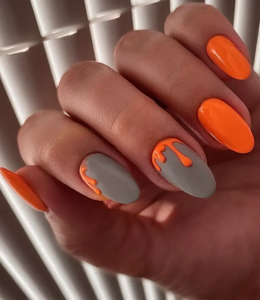 Long Summer Nails for 2025 Glow Grey Meets Neon Orange Drip