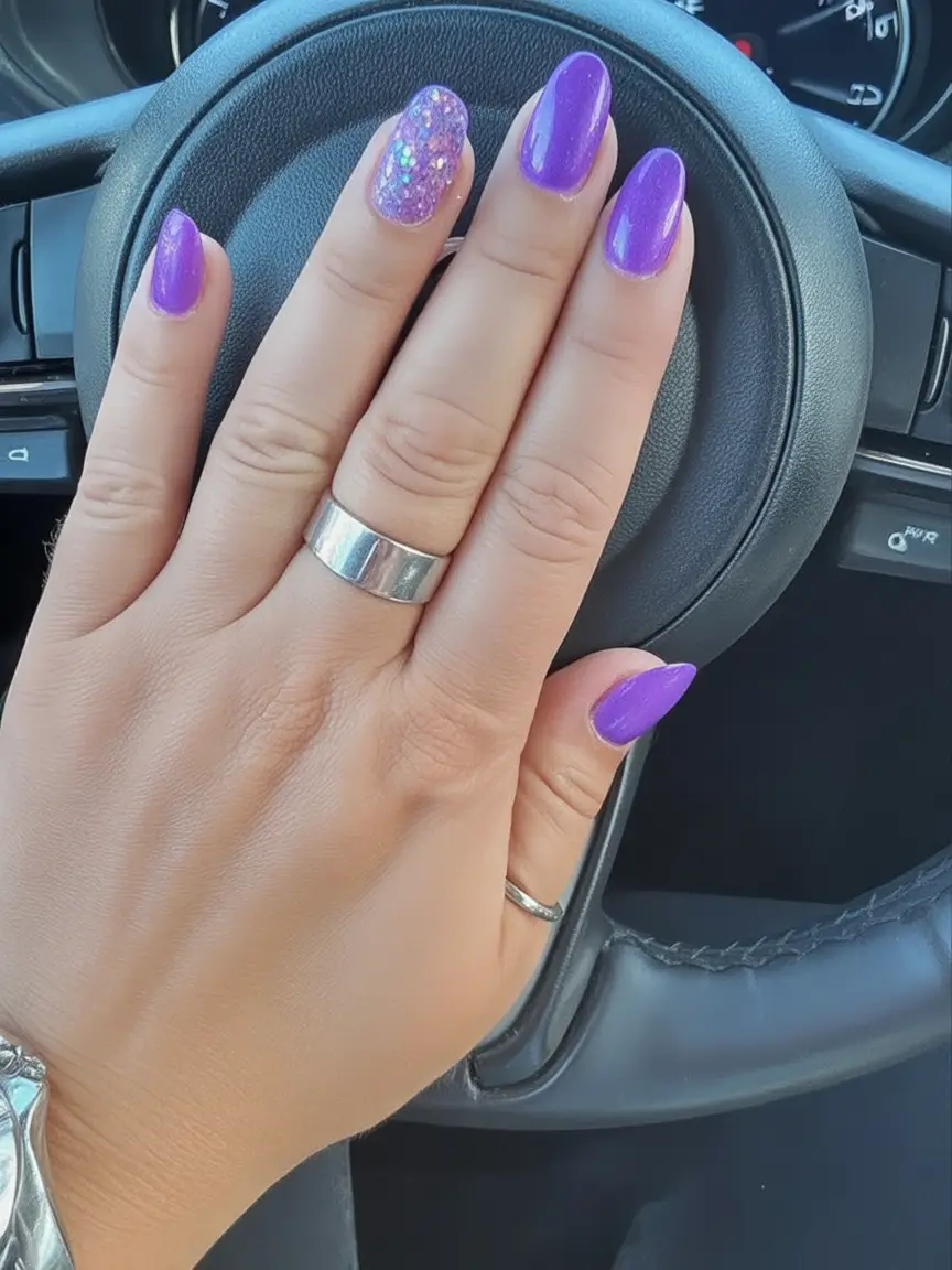 Oval Nail Looks for Summer 2025 Bold Purple Glam With Glitter Pop