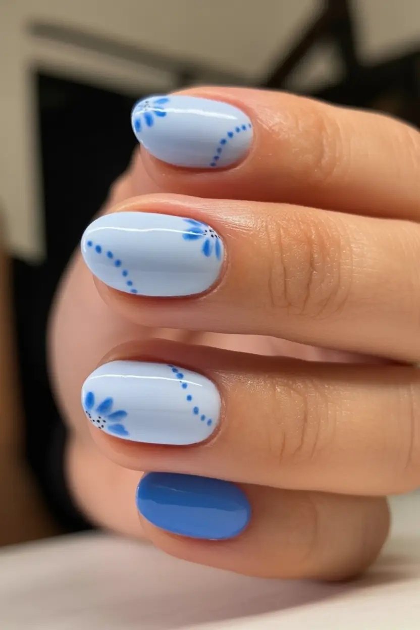 Oval Nail Looks for Summer 2025 Dainty Blue Petal Dots