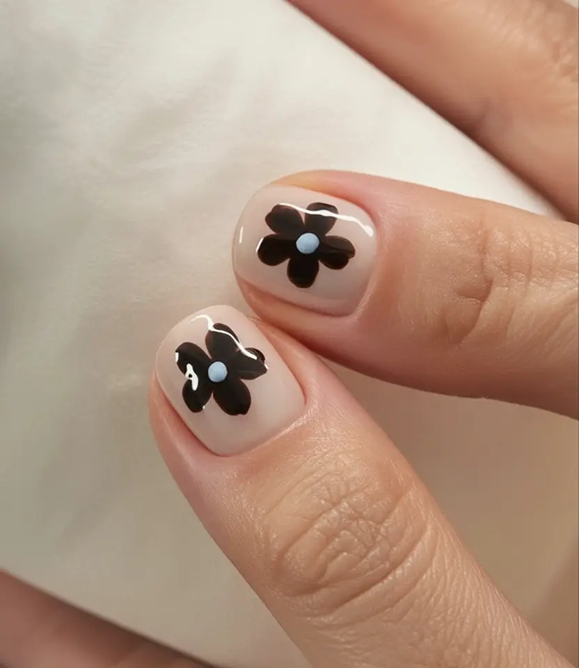 Round Nail Inspo for Summer 2025 Monochrome Blooms on Nude