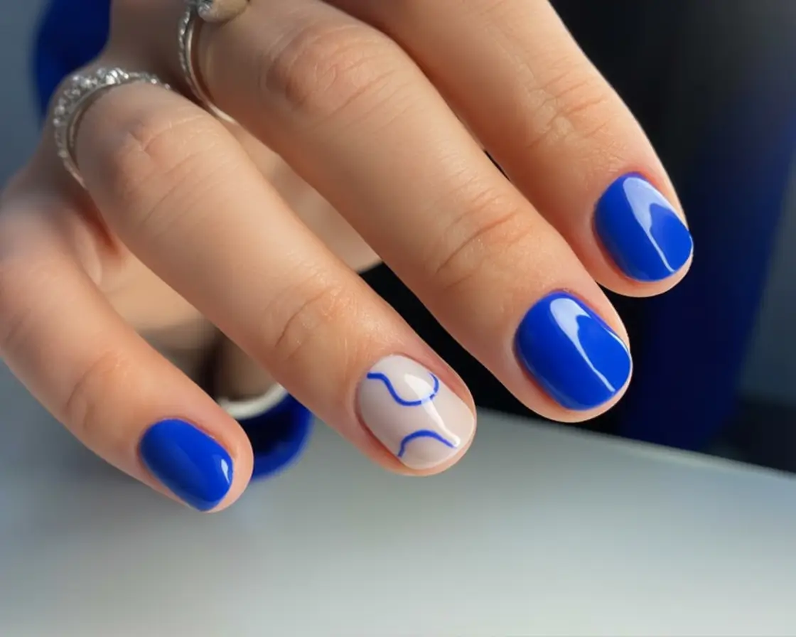 Round Nail Inspo for Summer 2025 Electric Blue Meets Negative Space