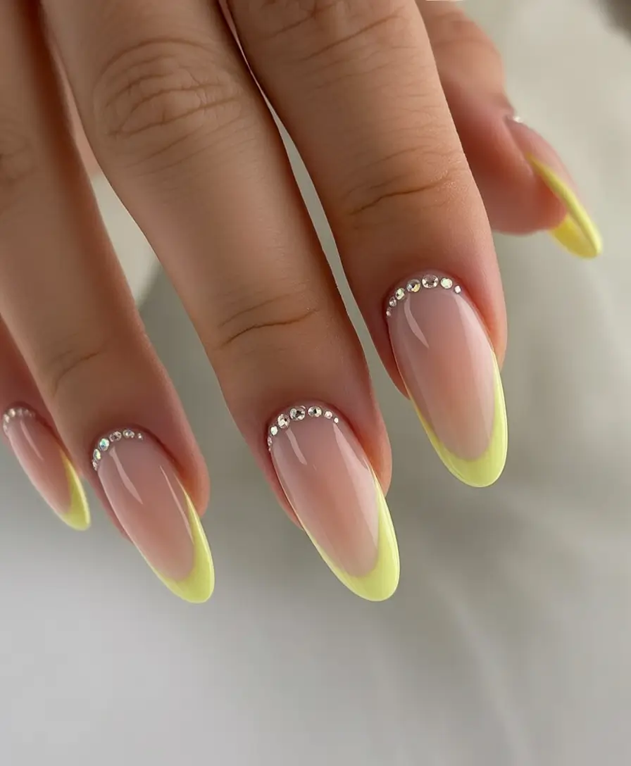 Summer 2025 Nail Designs to Try Pastel Yellow French With Crystal Cuticles