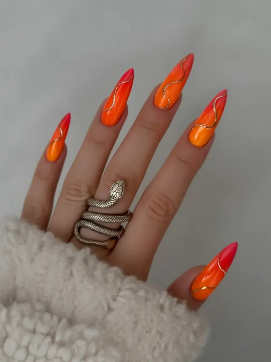Summer 2025 Nail Designs to Try Hot Orange Flame Tips With Gold Accent