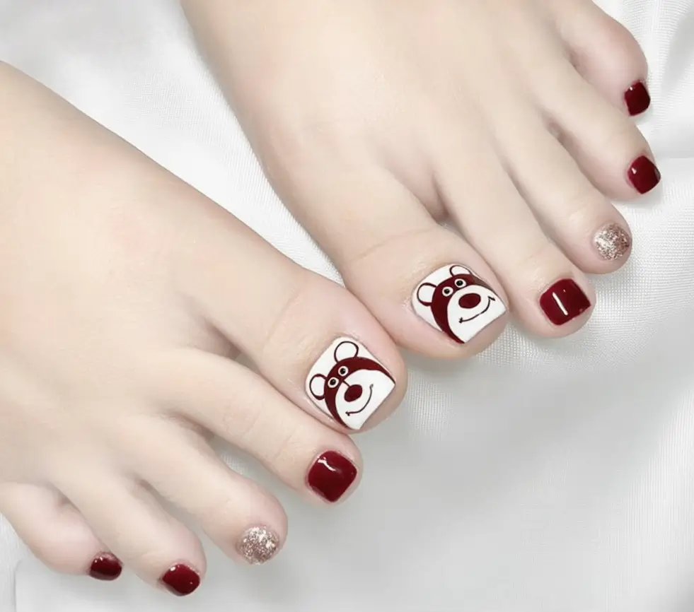 Maroon With Bear Faces Toe Nail Design Caption: Extremely Fun Summer Thematic Toe Designs For 2025