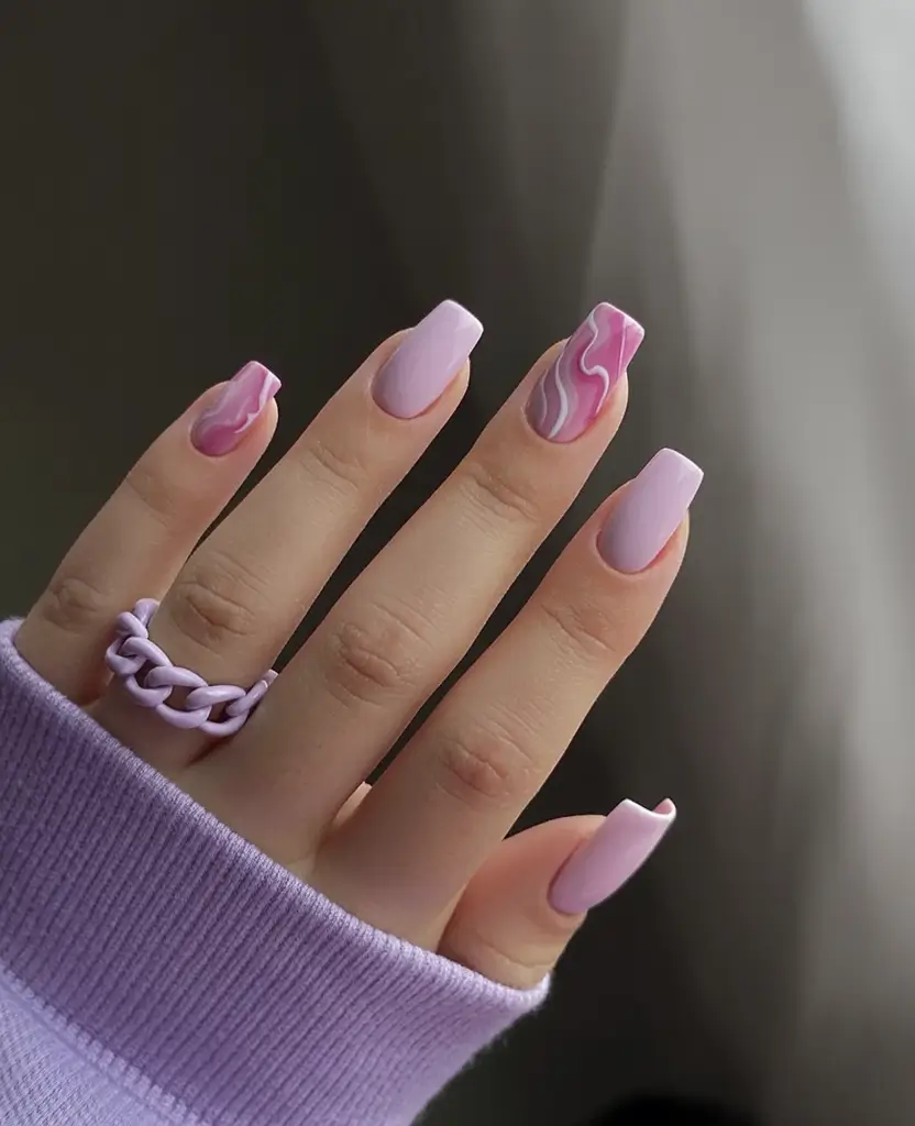 Top Nail Colors for Summer 2025 Matte Pink Swirls