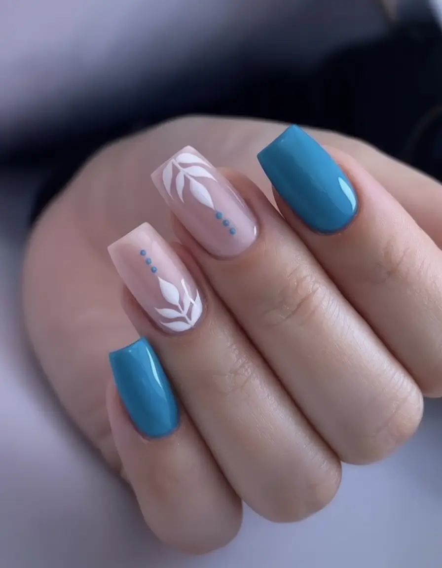 Top Nail Colors for Summer 2025 Sky Blue Botanicals on Glossy Nude