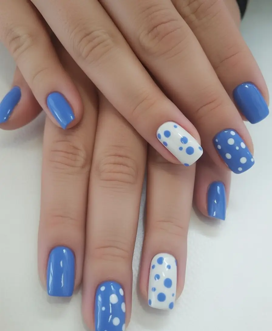 Vacation Nails Perfect for 2025 Blue Polka Dots for a Classy Beach Mood