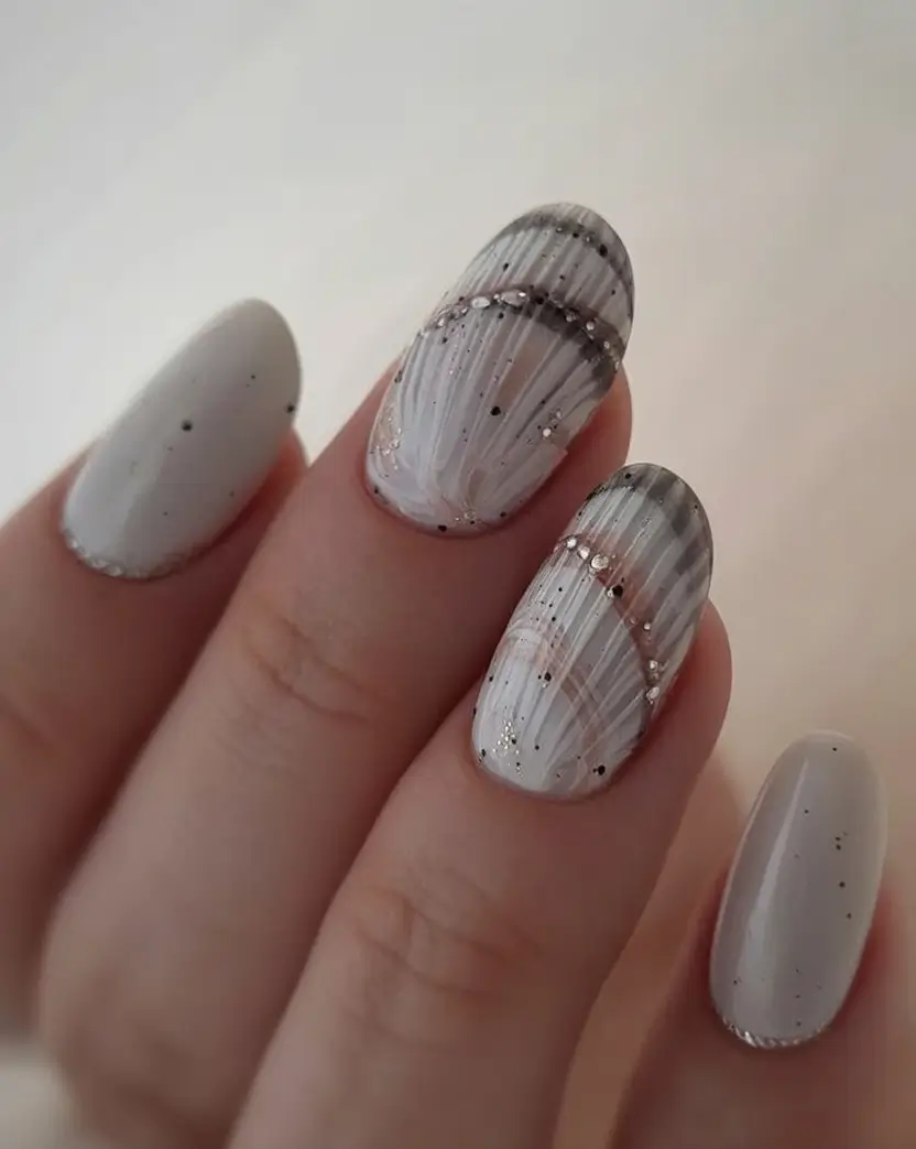 Vacation Nails to Pack for Summer 2025 Subtle Swirls In Sandy Neutrals