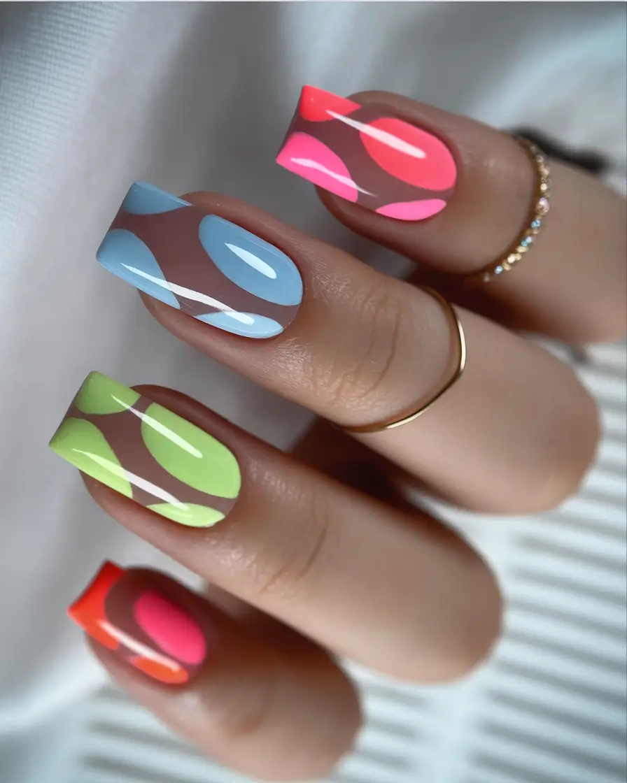 Fun Nail Color Ideas for August 2025 Psychedelic Pop Art Swirls