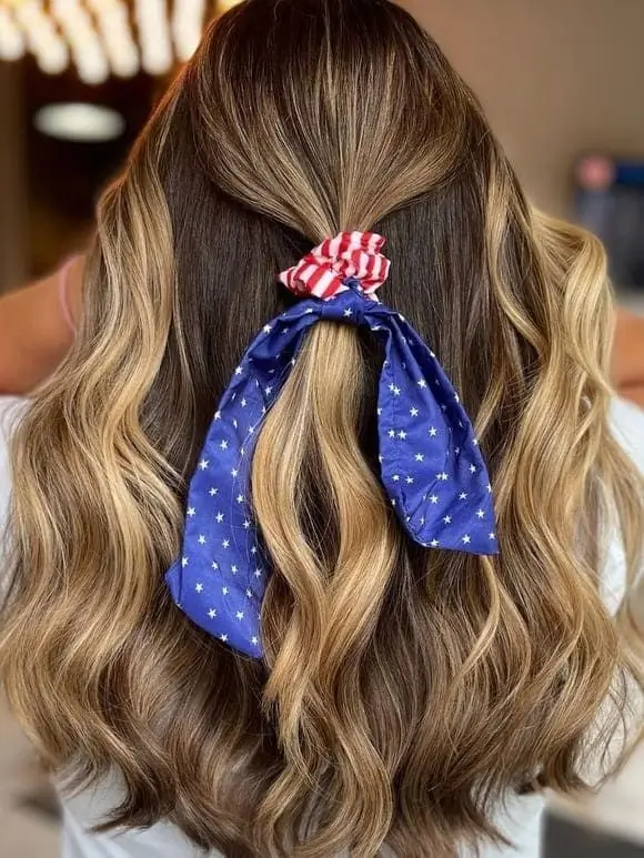 Hair Looks That Celebrate July 4th 2025 Spiral Ponytail with Star Tinsel