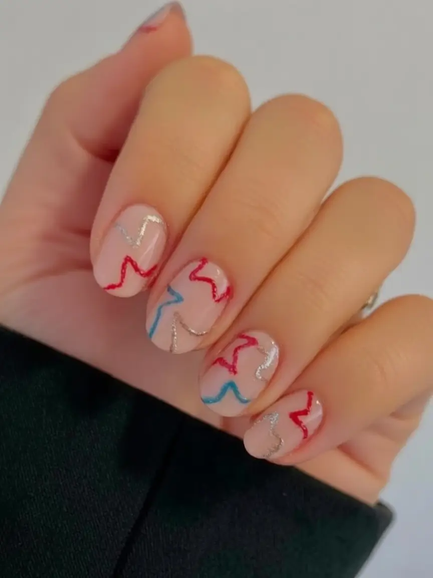 Nail Designs for July 4th 2025 Squiggle Stars for a Soft Fun Look
