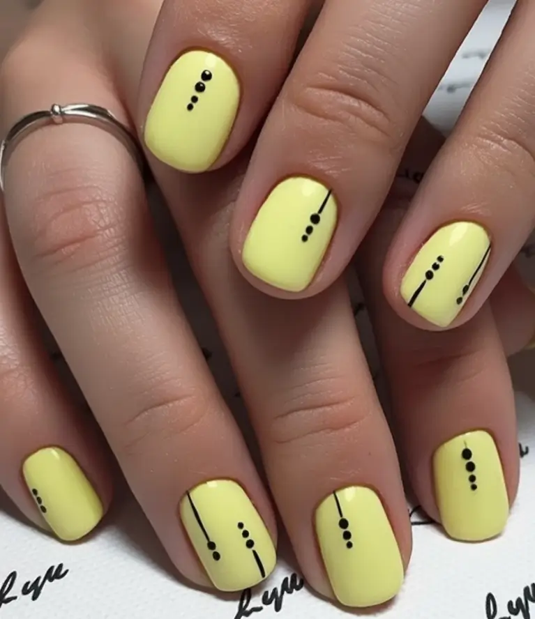 Nail Designs to Try in August 2025 Minimal Dots On Butter Yellow