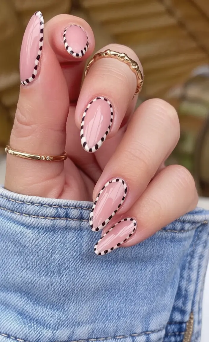 nail designs to try in august 2025 Parisian Polish With A Twist